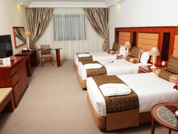 Marigold Hotel : photo 5 de la chambre chambre triple deluxe