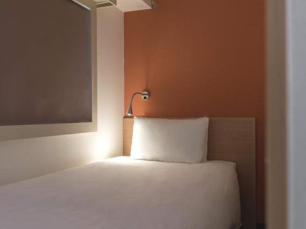 the b sangenjaya : photo 2 de la chambre single room (l-shaped) - non-smoking