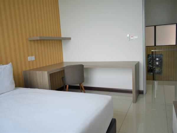 D'Wharf Hotel & Serviced Residence : photo 10 de la chambre suite en duplex