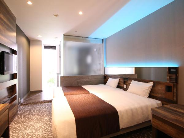 Quintessa Hotel Sapporo : photo 6 de la chambre chambre lits jumeaux hollywood - non-fumeurs