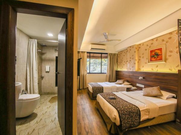 Hotel Maharana Inn Chembur : photo 1 de la chambre hébergement lits jumeaux affaires