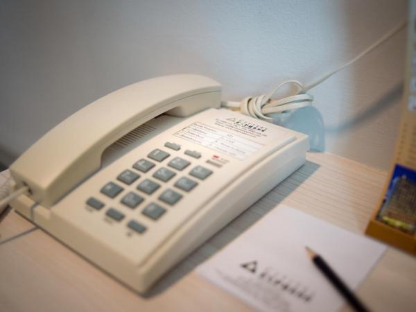 Cititel Express Kota Kinabalu : photo 4 de la chambre chambre lits jumeaux standard - sans fenêtre