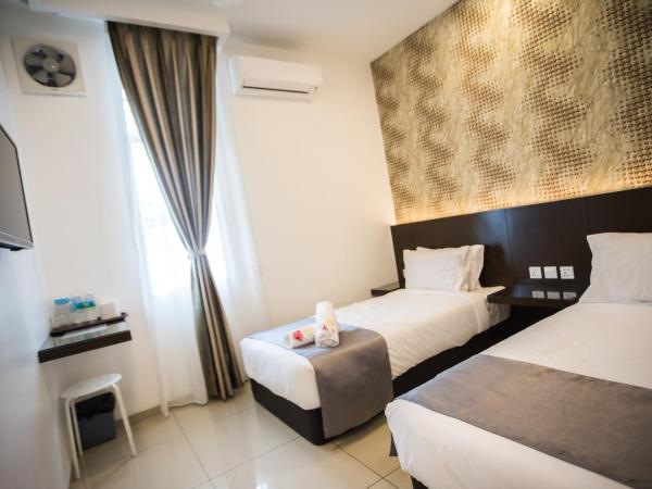 IM 96 Villa : photo 7 de la chambre chambre lits jumeaux deluxe