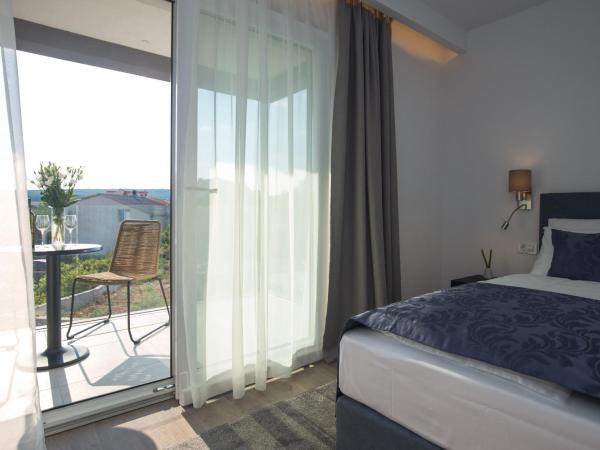 Pansion Leggero : photo 3 de la chambre chambre double de luxe avec balcon - vue sur ville