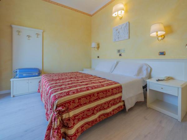 Hotel Executive La Fiorita : photo 2 de la chambre chambre double ou lits jumeaux