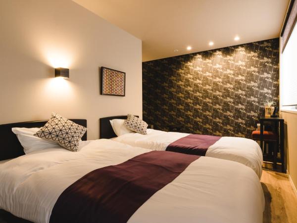 Trip Base HAKATAEKIMAE : photo 4 de la chambre chambre triple