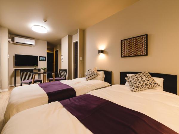 Trip Base HAKATAEKIMAE : photo 5 de la chambre chambre triple