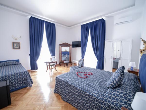 Di Palma Suite : photo 5 de la chambre chambre quadruple de luxe