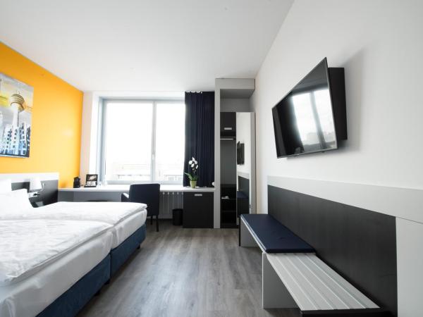 Carathotel Düsseldorf City : photo 2 de la chambre chambre double ou lits jumeaux standard