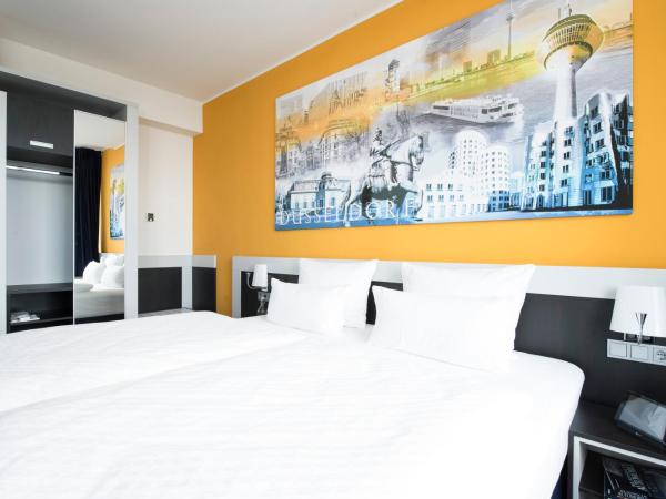 Carathotel Düsseldorf City : photo 5 de la chambre suite