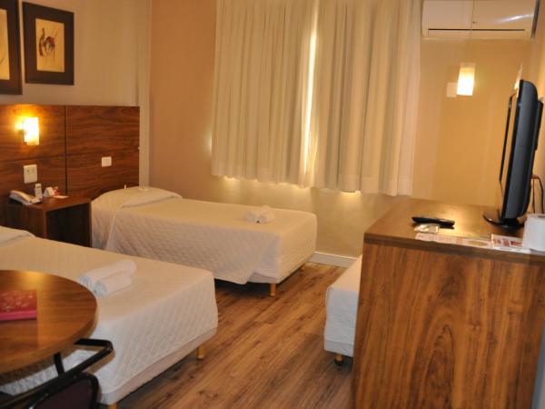 SJ Executive - San Juan Curitiba : photo 2 de la chambre chambre triple exécutive