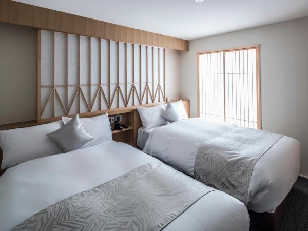 Tomoya Residence Hotel Kyoto : photo 1 de la chambre suite 1 chambre lits jumeaux avec kitchenette