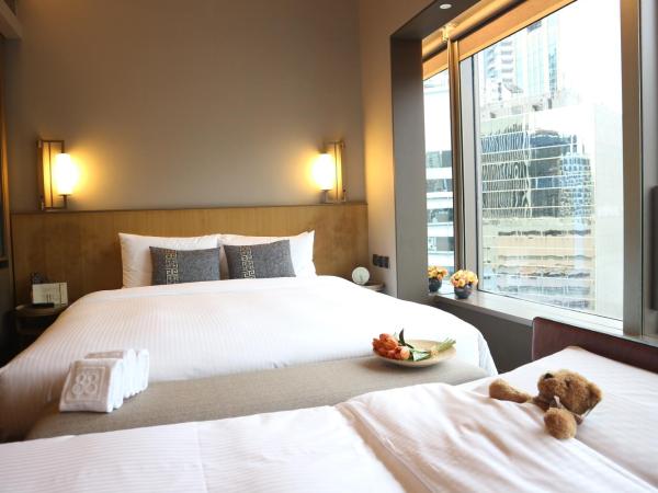 Wanchai 88 : photo 3 de la chambre chambre familiale (1 lit king-size et 1 lit pliant)