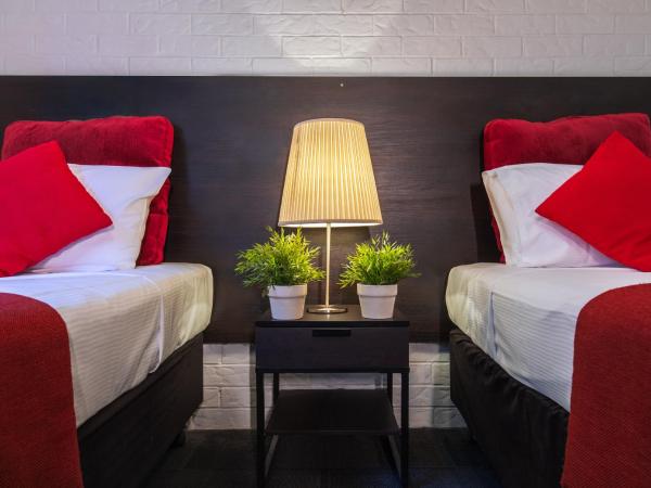 Ascot Budget Inn & Residences : photo 3 de la chambre chambre lits jumeaux Économique avec salle de bains commune