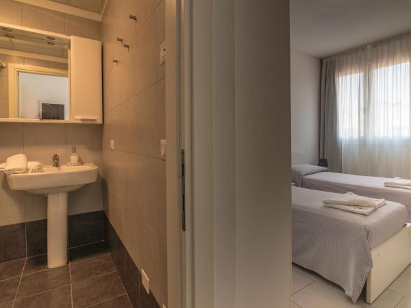 Casa Lucia Valentini Terrani : photo 3 de la chambre chambre lits jumeaux