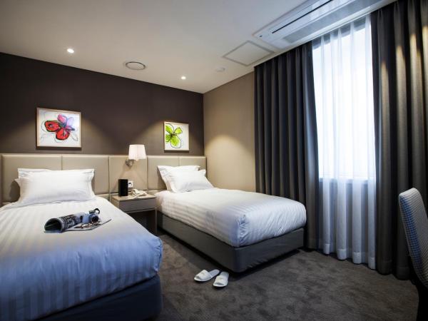 The Grand Hotel Myeongdong : photo 1 de la chambre chambre lits jumeaux standard