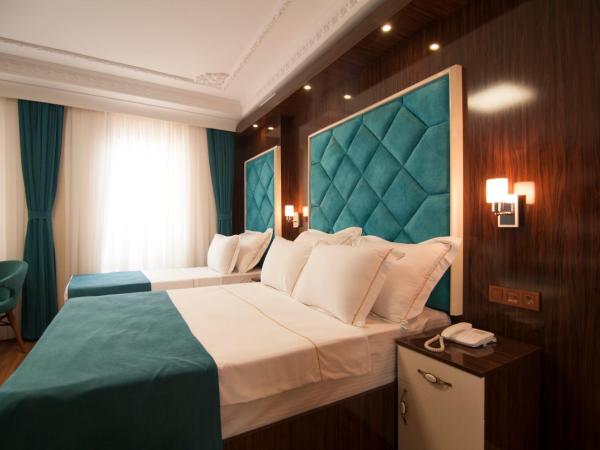 Akbiyik Suite Boutique Hotel : photo 5 de la chambre chambre triple supérieure