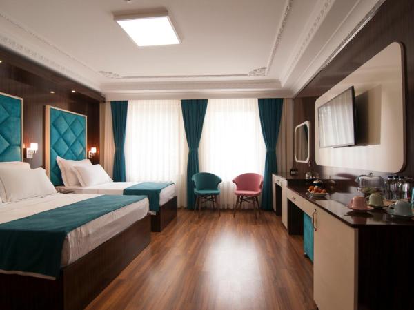 Akbiyik Suite Boutique Hotel : photo 1 de la chambre chambre triple supérieure