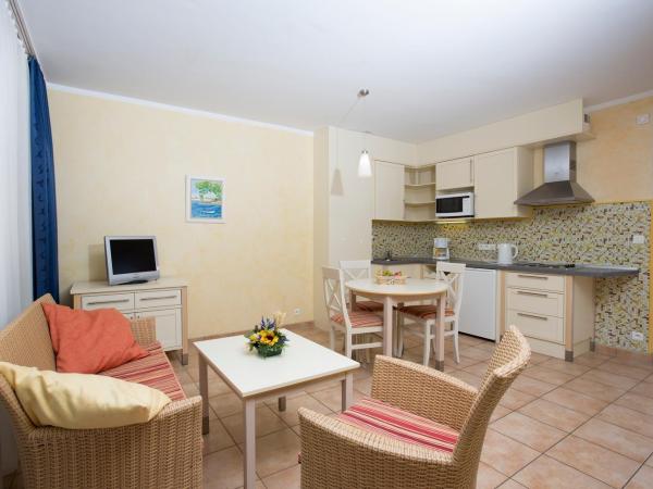 Résidence les Tourelles : photo 4 de la chambre studio lit queen-size