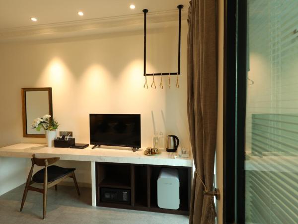 Manhattan Residence By Reunion : photo 10 de la chambre chambre exécutive avec 2 lits queen-size