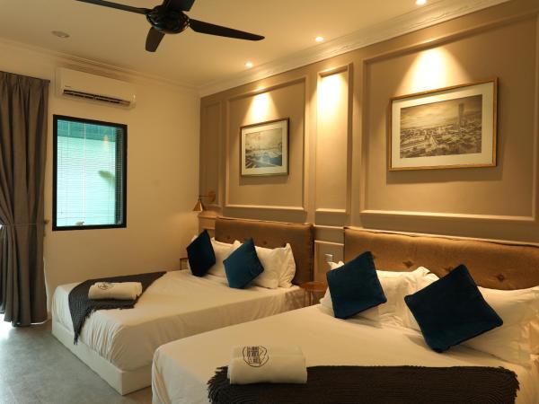 Manhattan Residence By Reunion : photo 9 de la chambre chambre exécutive avec 2 lits queen-size