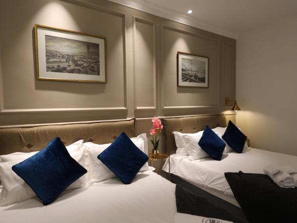 Manhattan Residence By Reunion : photo 8 de la chambre chambre deluxe avec 2 lits queen-size