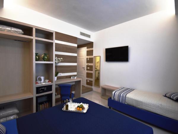 Melody Sorrento Suites : photo 7 de la chambre chambre triple classique