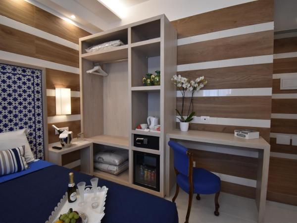 Melody Sorrento Suites : photo 10 de la chambre chambre triple classique