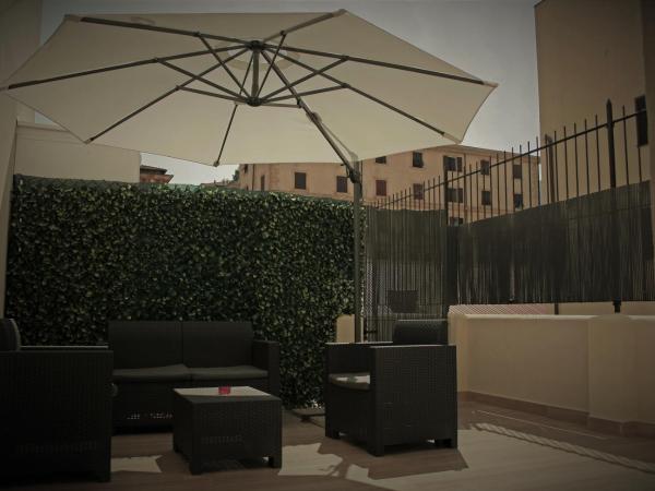 Real Rooms : photo 1 de la chambre chambre double avec terrasse
