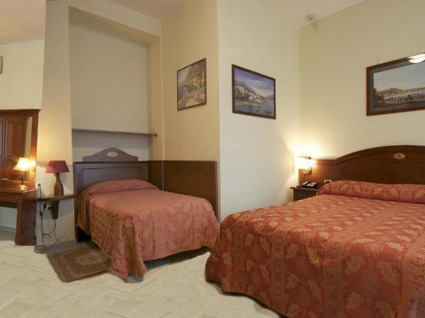 Hotel Pavone : photo 1 de la chambre chambre quadruple