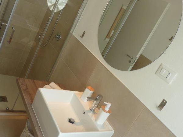 L'Ulivo : photo 1 de la chambre chambre double ou lits jumeaux avec lit d'appoint