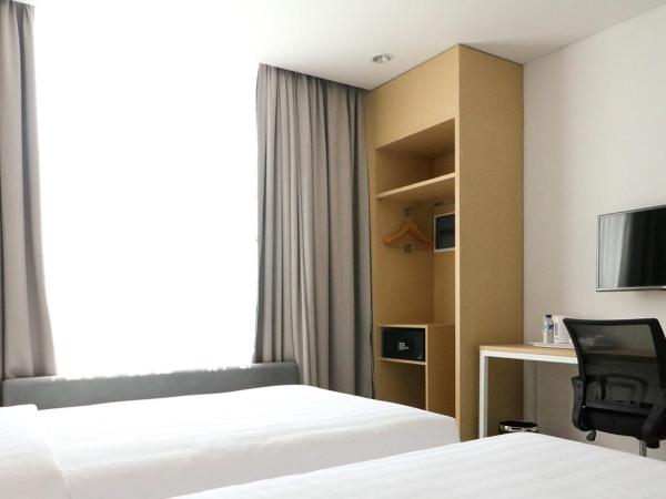 PALM PARK Hotel Surabaya : photo 5 de la chambre chambre lits jumeaux deluxe