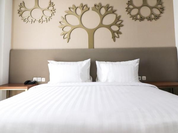 PALM PARK Hotel Surabaya : photo 5 de la chambre suite familiale