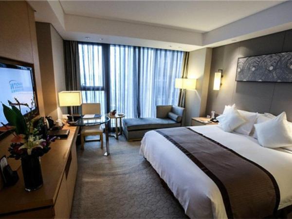 Howard Johnson IFC Plaza Ningbo : photo 7 de la chambre chambre lit king-size deluxe