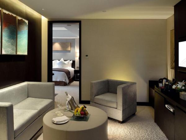 Howard Johnson IFC Plaza Ningbo : photo 2 de la chambre suite deluxe