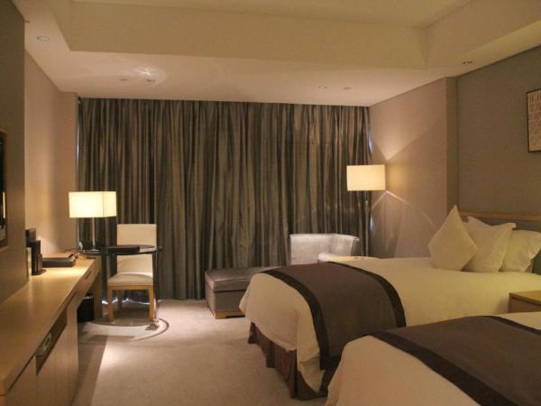 Howard Johnson IFC Plaza Ningbo : photo 5 de la chambre chambre lit king-size deluxe