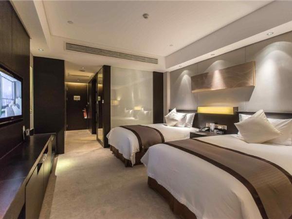 Howard Johnson IFC Plaza Ningbo : photo 2 de la chambre chambre lit king-size deluxe