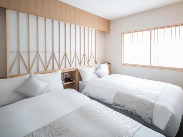 Tomoya Residence Hotel Kyoto : photo 2 de la chambre suite 1 chambre lits jumeaux avec kitchenette - vue sur jardin - rez-de-chaussée