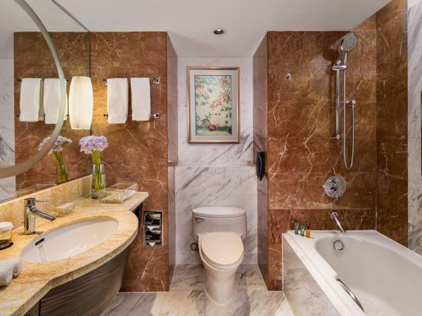 The Kunlun Jing An : photo 4 de la chambre hébergement exécutif deluxe avec lit king-size