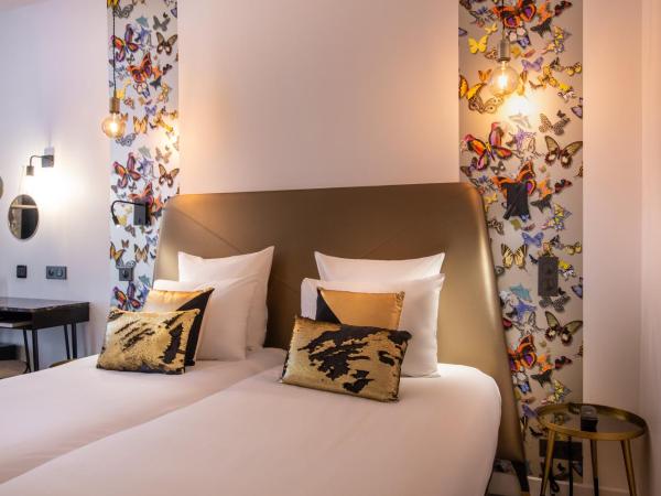 Hôtel Royal Opéra : photo 1 de la chambre chambre lits jumeaux