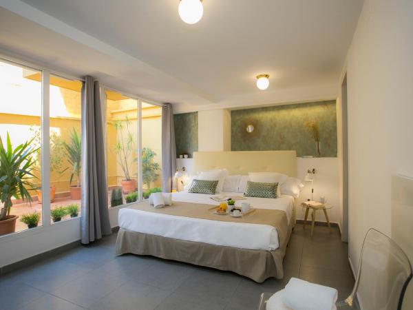 SingularStays Botanico 29 Rooms : photo 1 de la chambre chambre double avec terrasse
