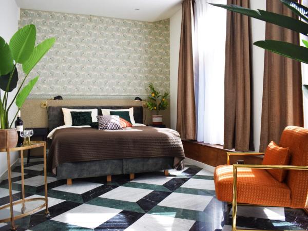 Brasss Hotel Suites : photo 1 de la chambre  suite deluxe savannah 