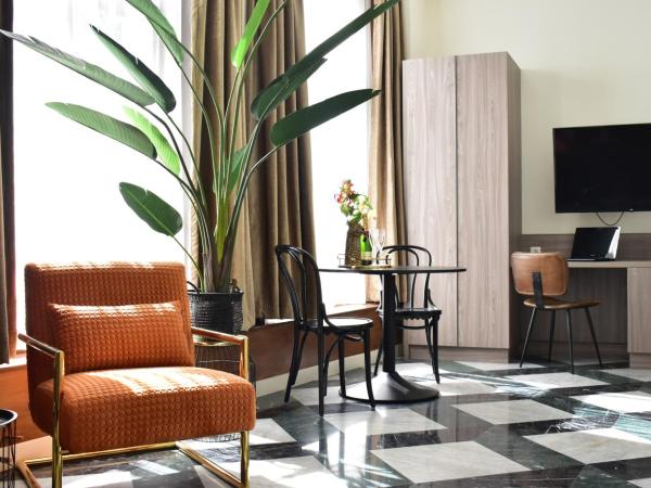 Brasss Hotel Suites : photo 5 de la chambre suite deluxe savannah