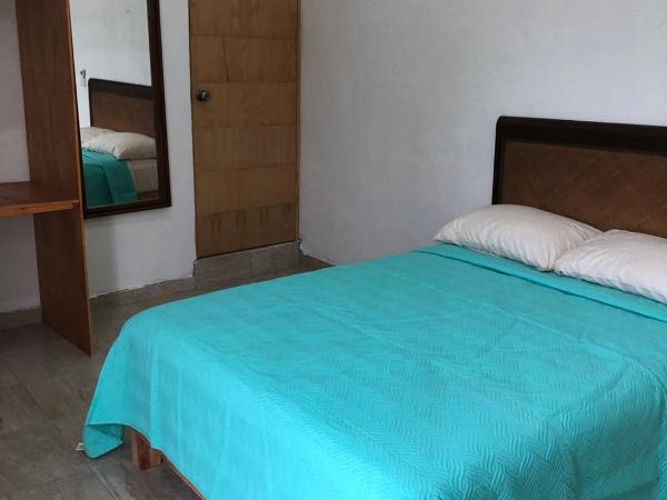 Airport Sleepy Inn : photo 4 de la chambre chambre lit queen-size deluxe