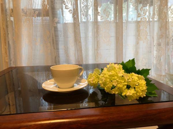 Happy Apartment : photo 10 de la chambre chambre familiale avec salle de bains privative