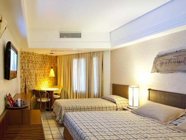 Rifoles Praia Hotel e Resort : photo 2 de la chambre chambre triple de luxe (3 adultes + 1 enfant)