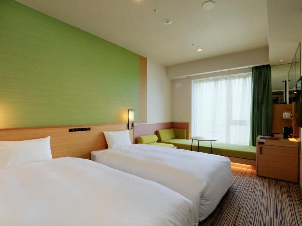 THE SINGULARI HOTEL & SKYSPA at UNIVERSAL STUDIOS JAPAN : photo 7 de la chambre chambre lits jumeaux standard avec canapé-lit - non-fumeurs - vue sur fleuve