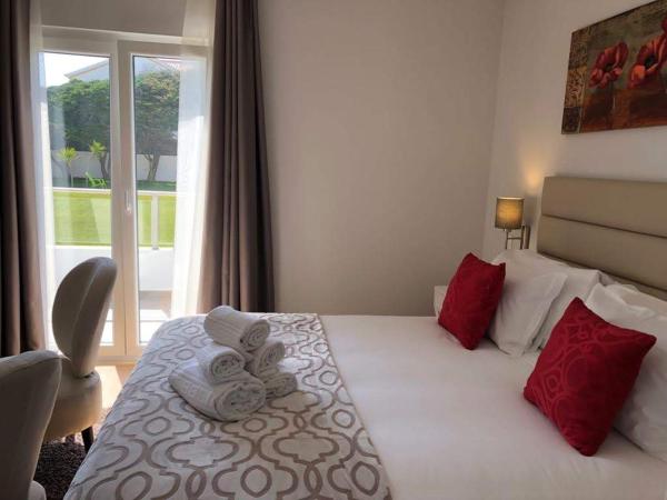 Silver Seahorse Garden Retreat : photo 3 de la chambre chambre double deluxe avec balcon