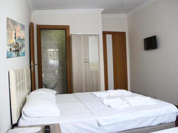 Marpalace Hotel : photo 2 de la chambre chambre quadruple