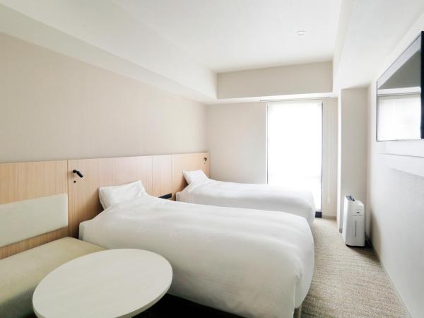 JR Inn Sapporo-eki Minami-guchi : photo 1 de la chambre chambre lits jumeaux - non-fumeurs